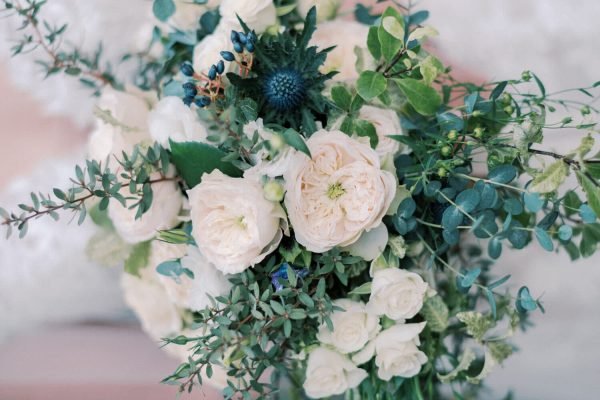 Bridal bouquet with roses and eucalyptus